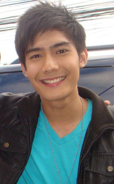 ยิ้มพิมพ์ใจของRobi domingo