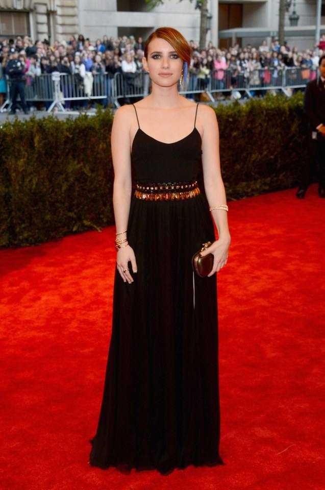 Emma Roberts in Diane Von Furstenberg gown and clutch