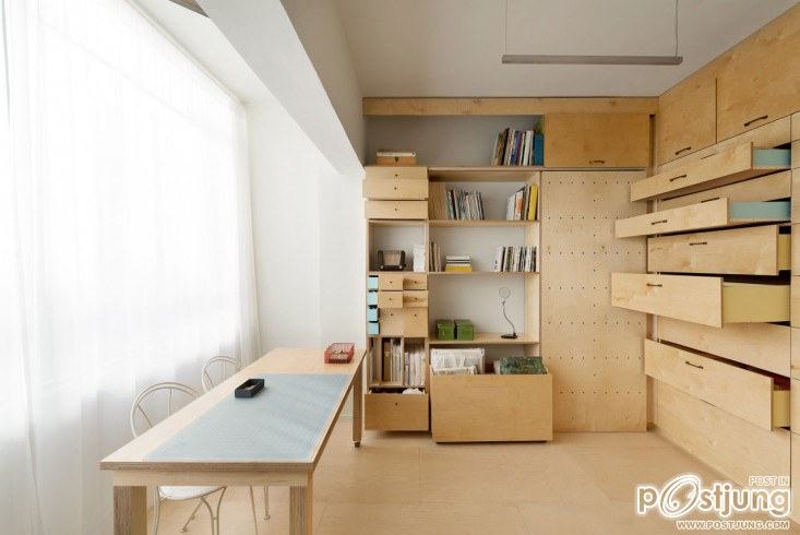 An Organizer's Dream: An Art Studio with Color-Coded Built-In Storage by Meredith Swinehart