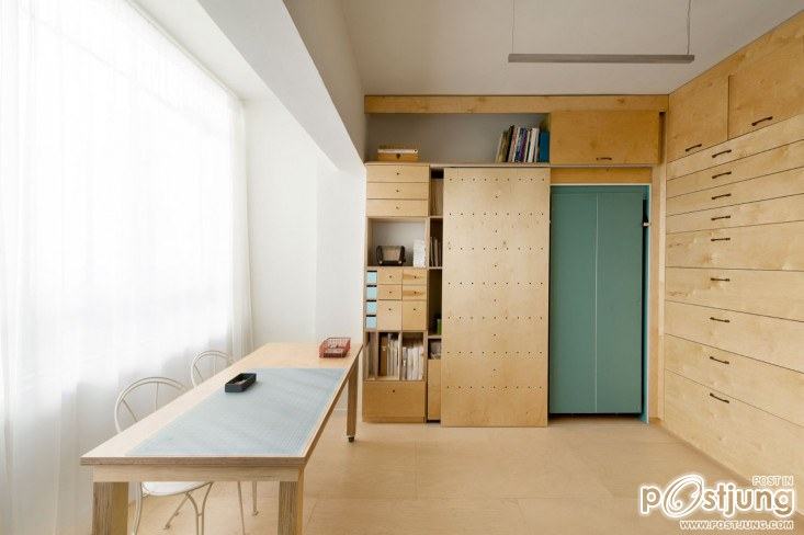An Organizer's Dream: An Art Studio with Color-Coded Built-In Storage by Meredith Swinehart