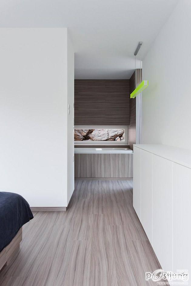 Timber Cabin Built into Cliff Side Site