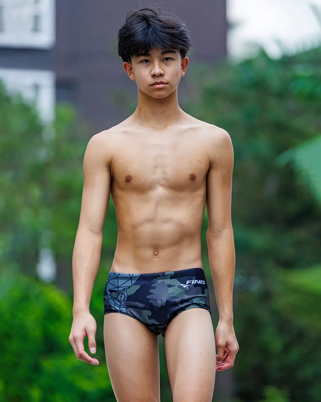 นักกีฬาว่ายน้ำหนุ่มน้อย 11